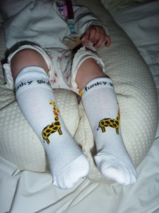 Chaussettes blanches avec la girafe.